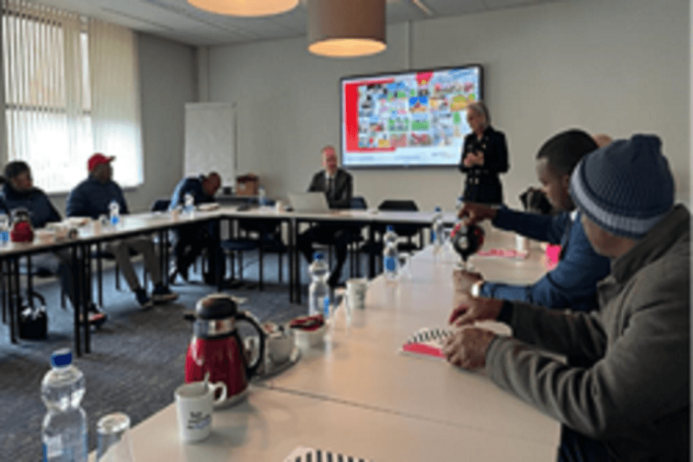 Group photo and presentation at Agrico