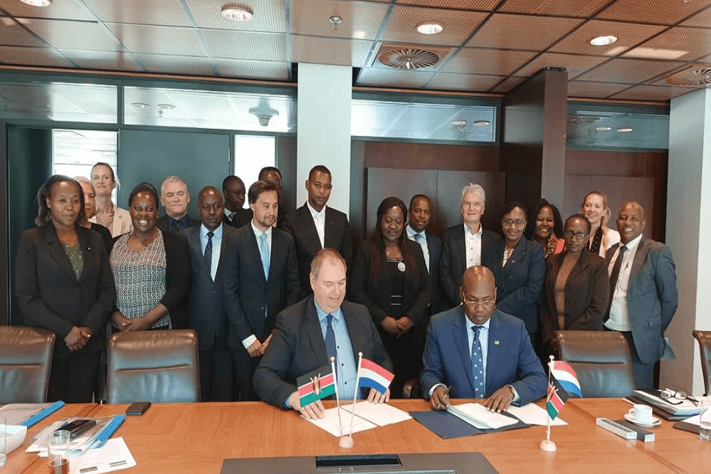 Signing of the agreed minutes by the Head of Delegation, Marcel van Raaij and Harry Kimtai