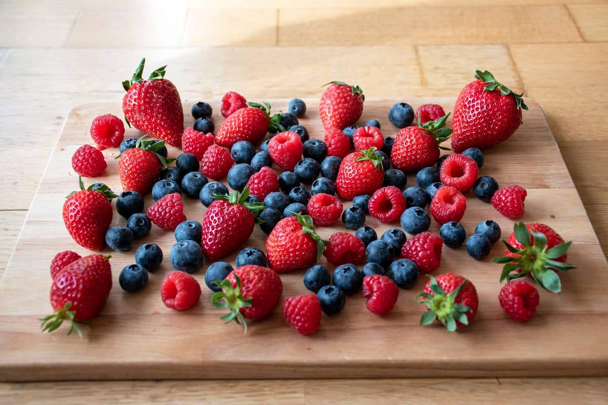 soft fruits on a wooden plate
