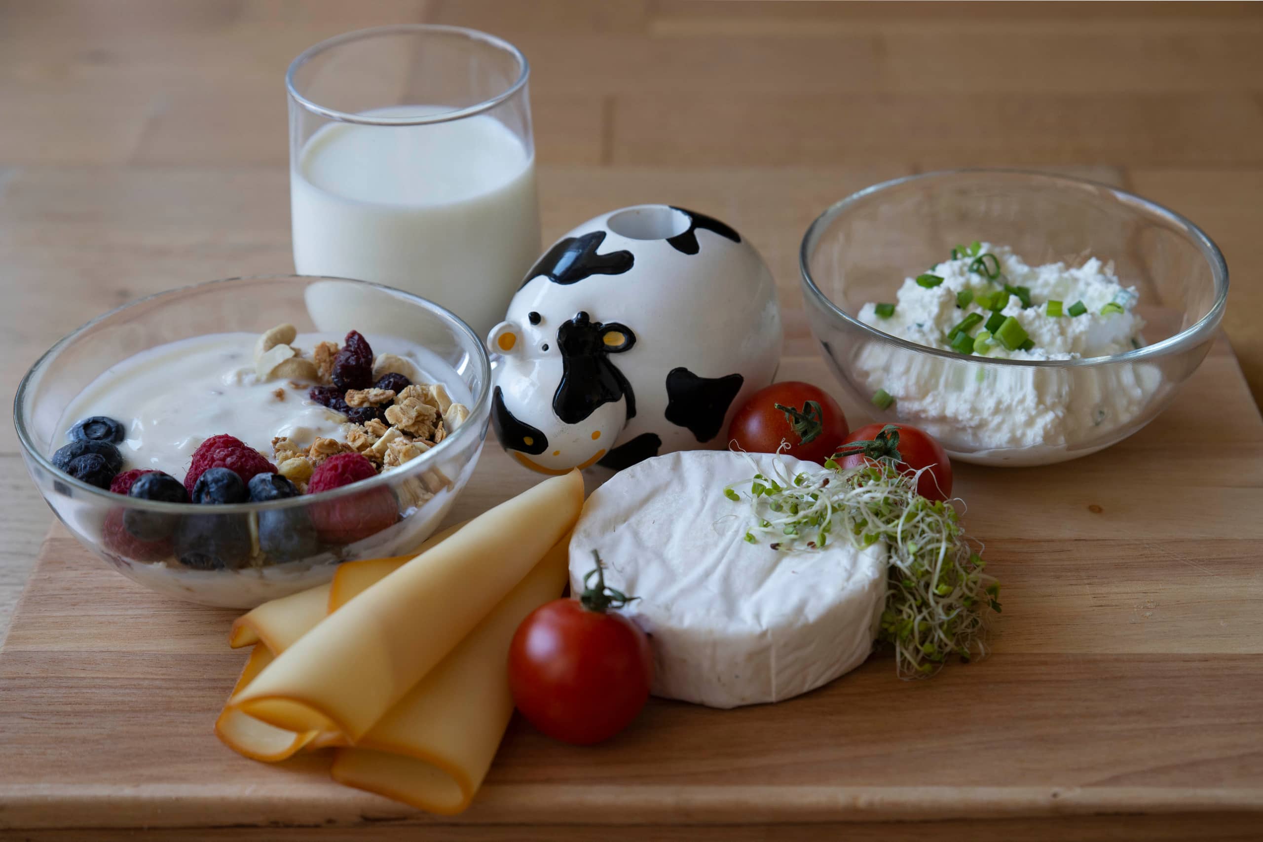 wooden plate with dairy products