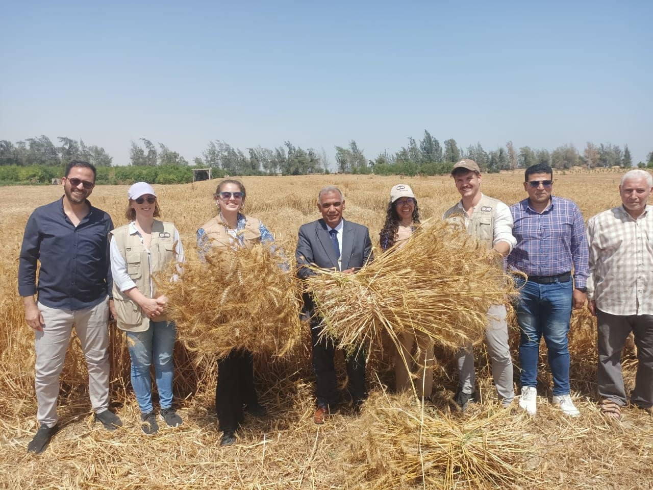 Co-founder & CMO at Chitosan with group of farmers at the field