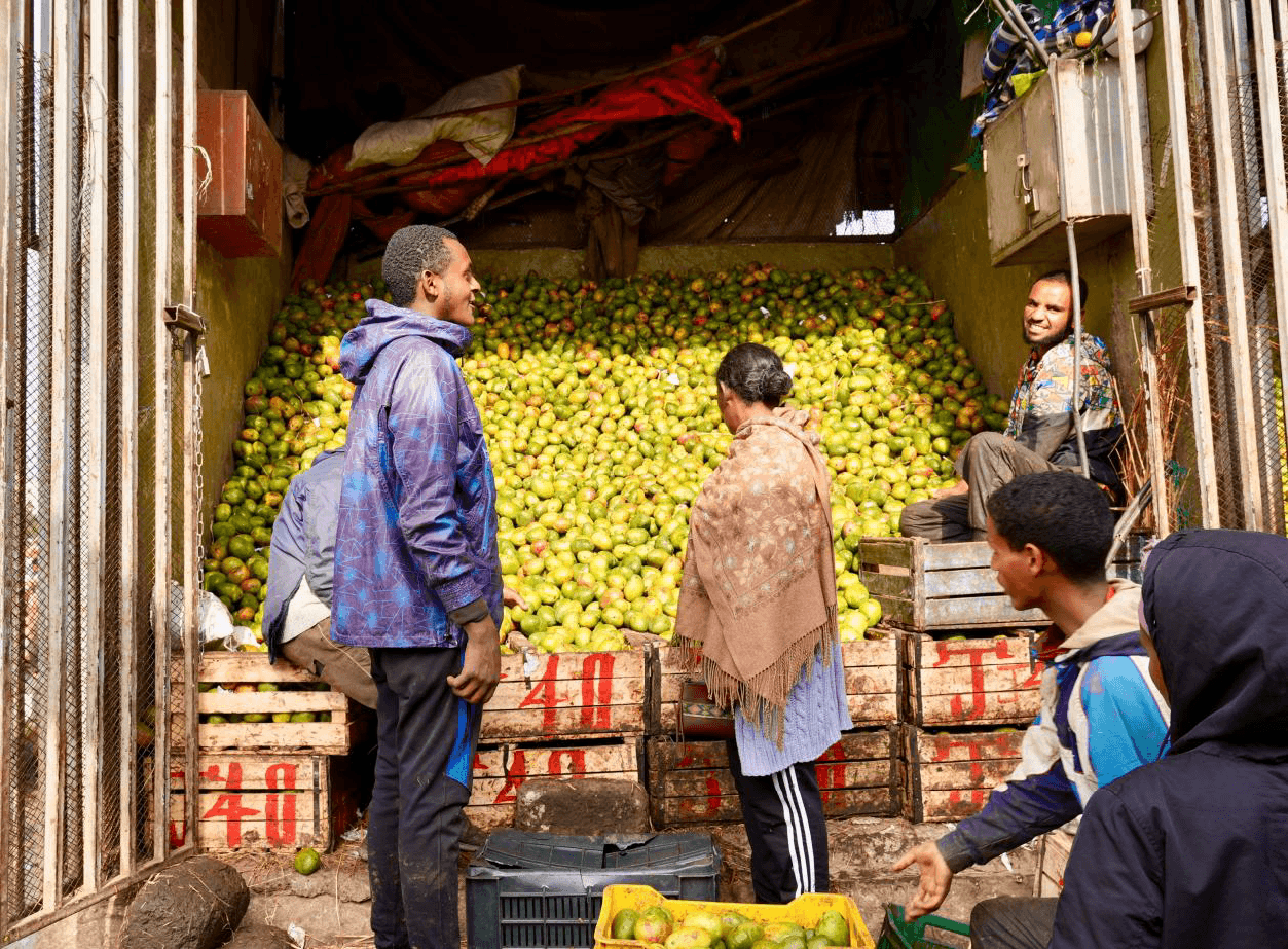 Fresh produce vendors at Atikit Tera Market