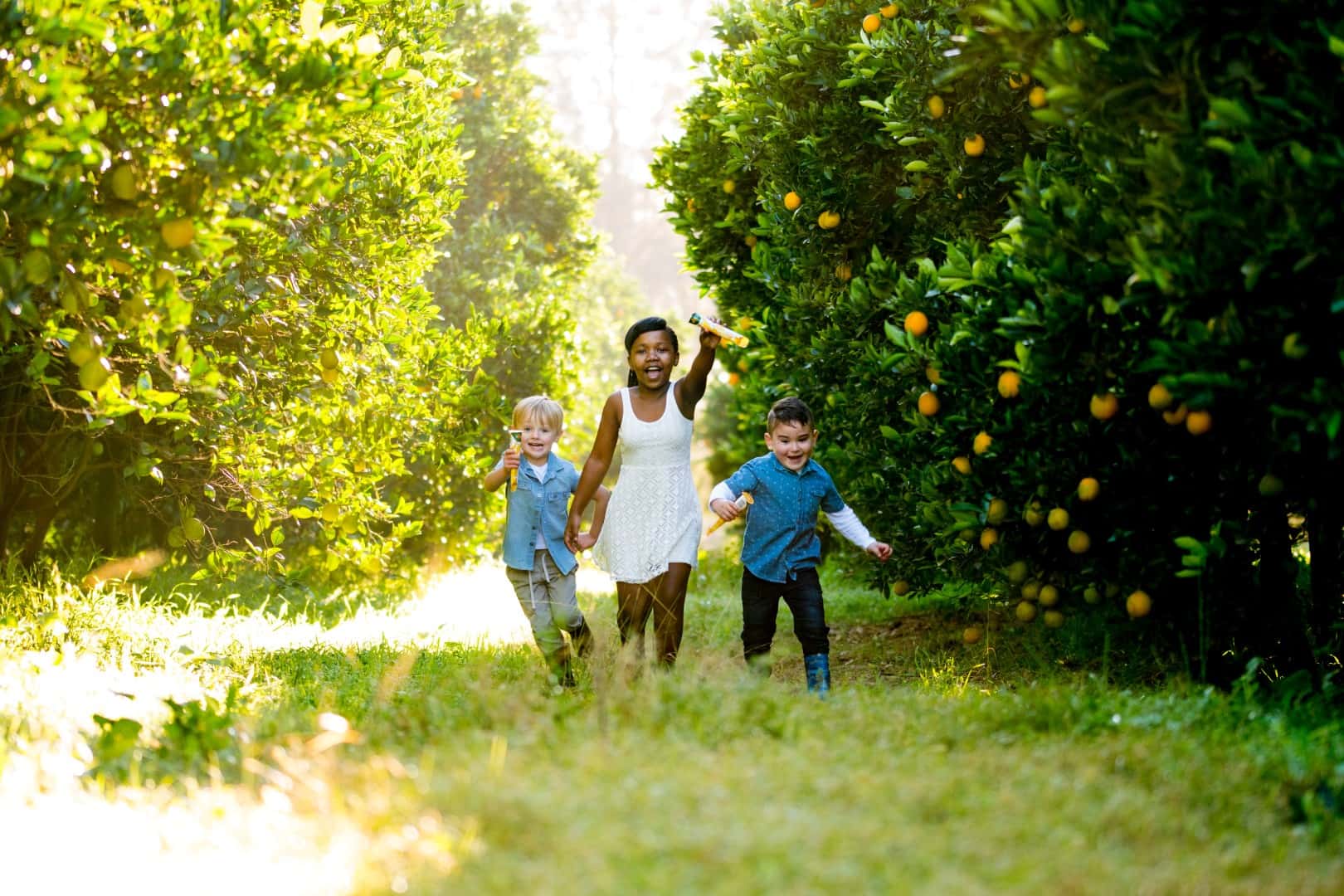 children running on grass