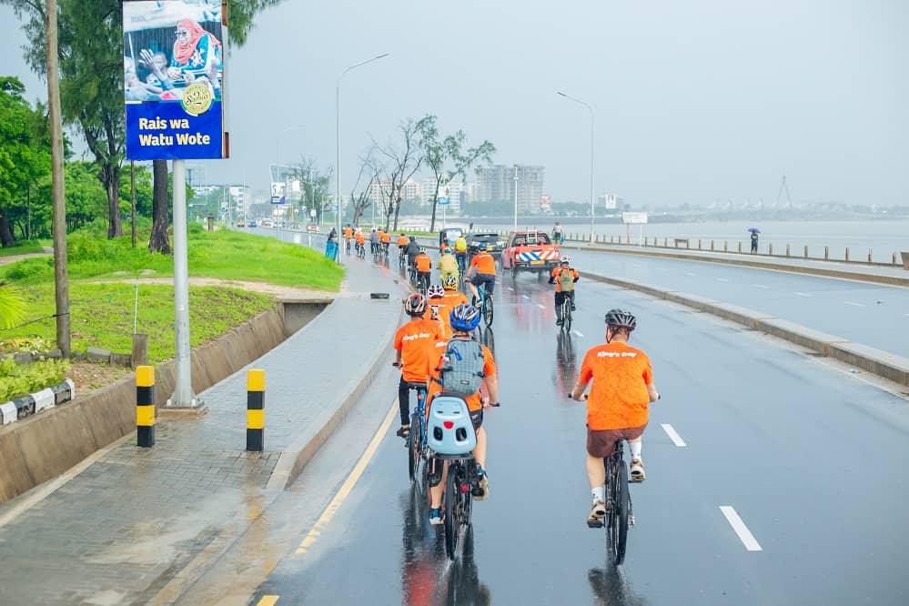 King's Day Reception Dar es Salaam - embassy team cycling in Dar city