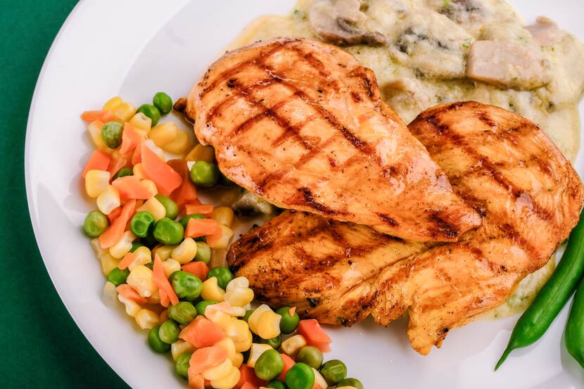 Roasted chicken with veggies.