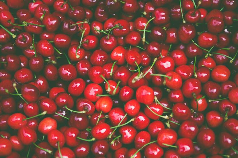 Picture of pile of fresh, ripe, red cherries