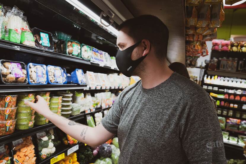 A man shopping in a grocery store