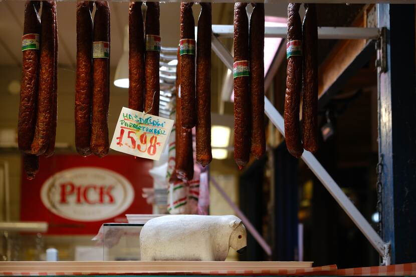 Smoked sausages of Hungary's iconic brand, Pick, hanging in a butcher shop.