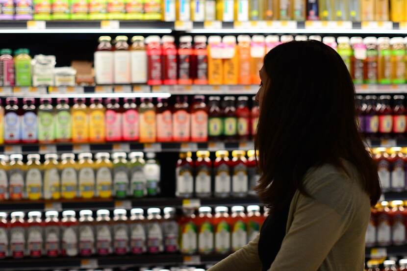 A woman shopping in a grocery store