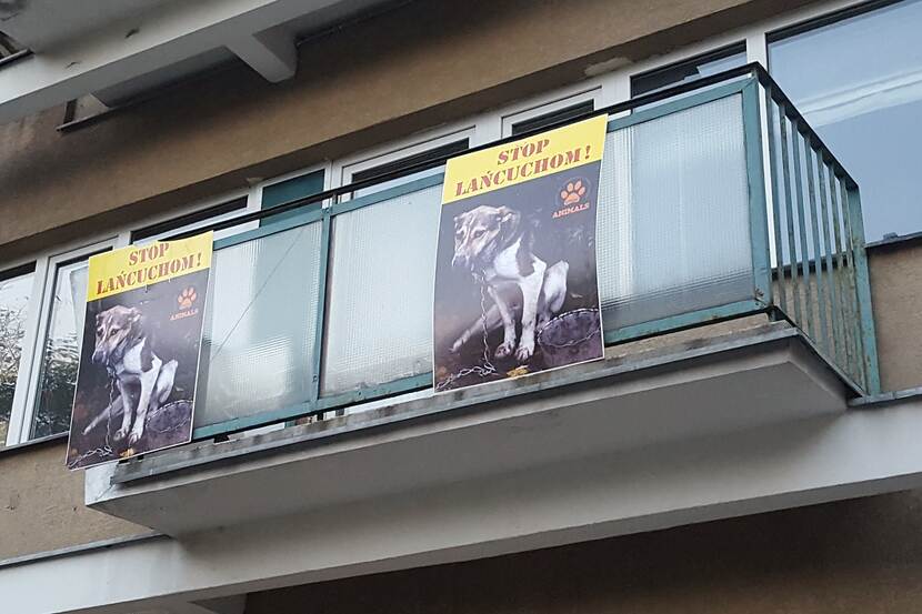 balcony with posters against animal suffer