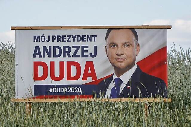 poster of Mr Andrzej Duda in the field of grain