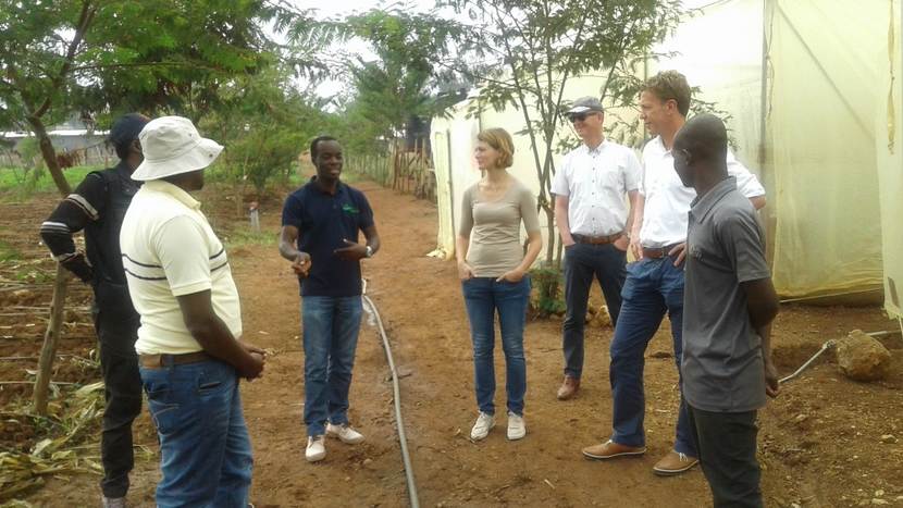 Agricultural Counselor with the delegation taking a tour around SUNRIPE Farm