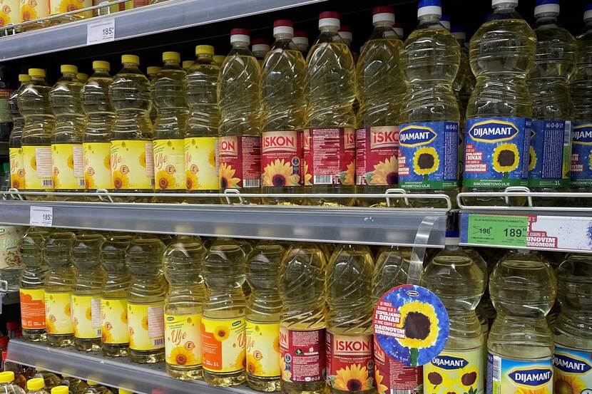 Shelves stocked with cooking oil in a grocery store in Serbia