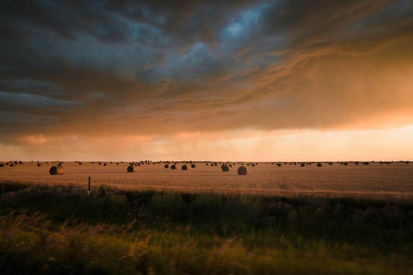 Storm coming to a harvested field