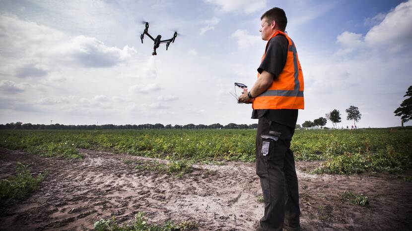 Farmer using drone